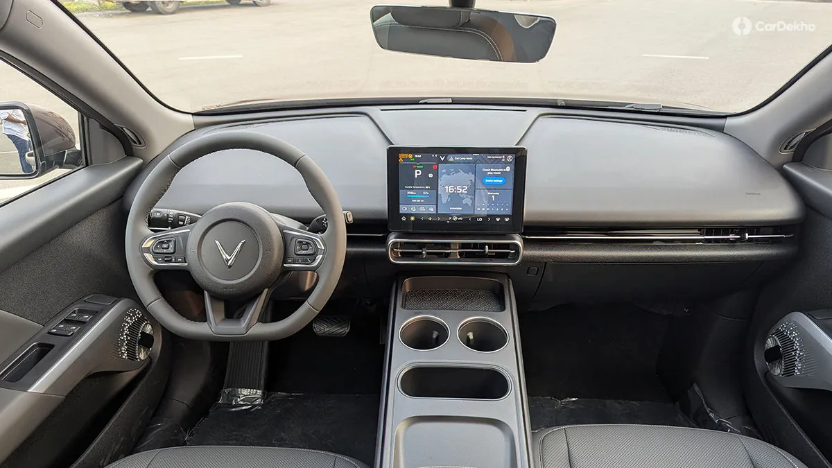 Factory cockpit reference. VinFast VF MPV 7 · cockpit photograph from the CarDekho review